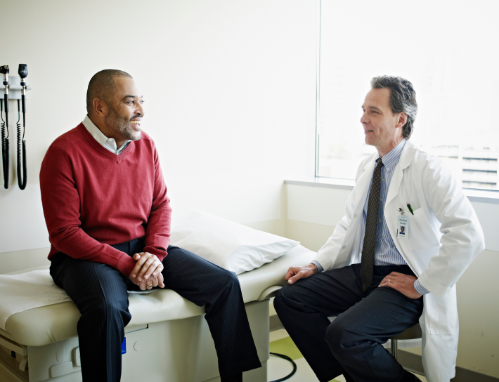 Male doctor and patient appointment